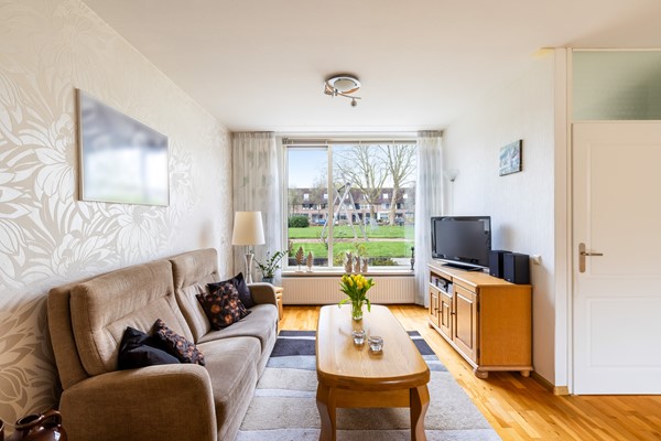 Foto - Te koop: tussenwoning gelegen aan groenvoorziening